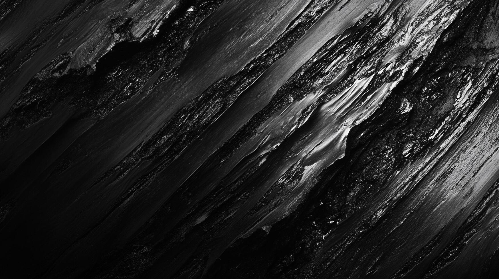 Dramatic, high-contrast abstract showcasing textures of rock formations with sharp ridges and deep shadows in monochromatic tones. photo