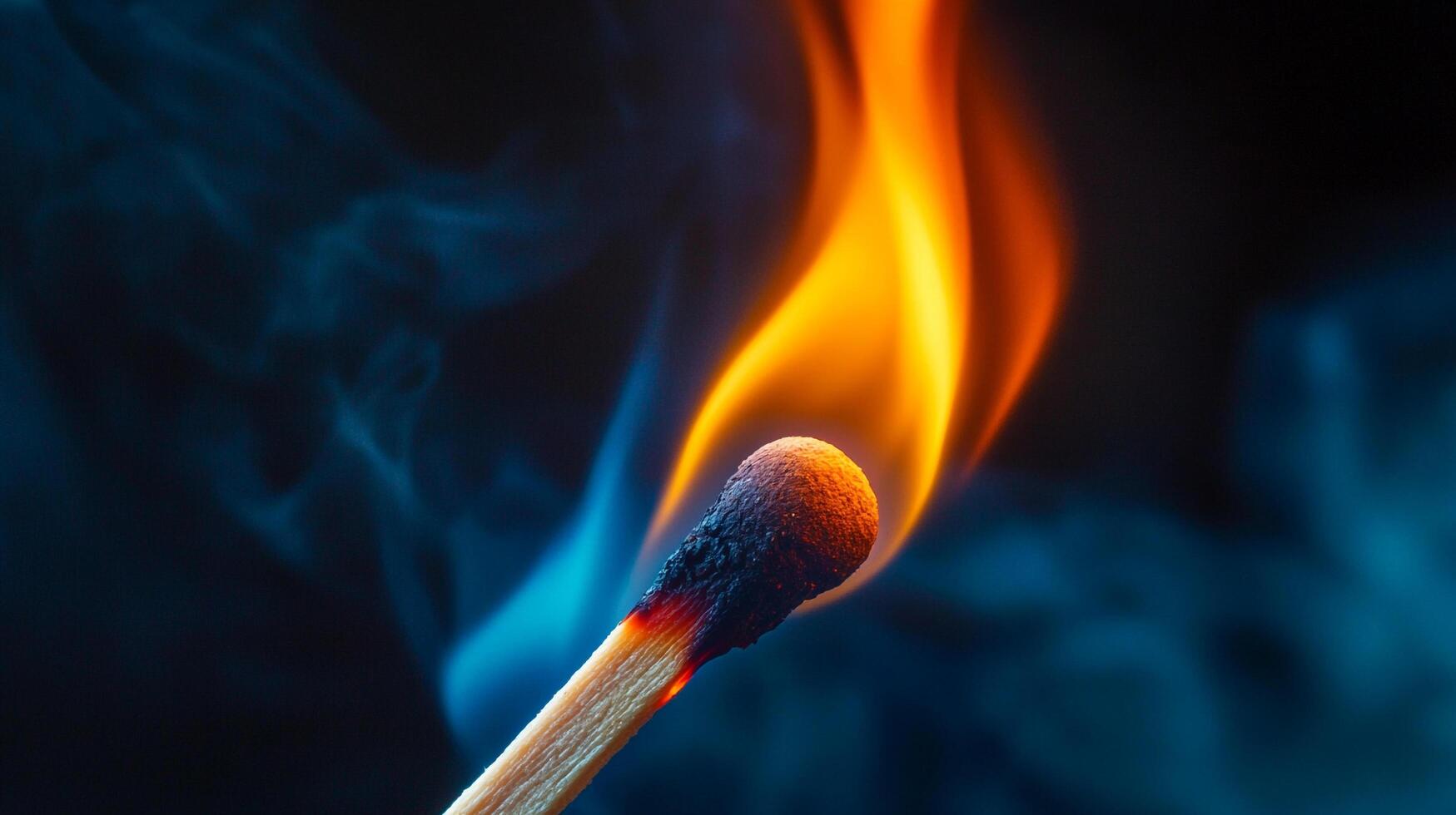 Ignited matchstick against dark background. Flames dance upward, casting a warm glow, contrasting the cool hues of the rising smoke. photo