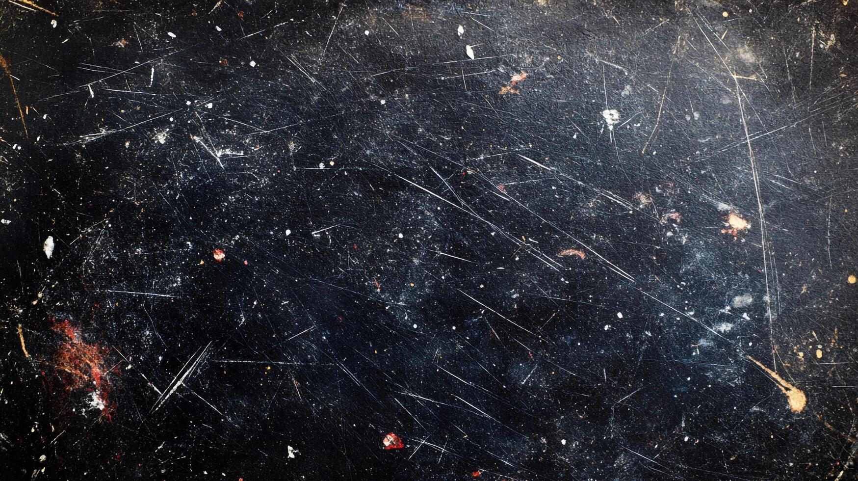 Distressed surface texture showing scratches and small dots against a dark background, creating a sense of age and wear photo