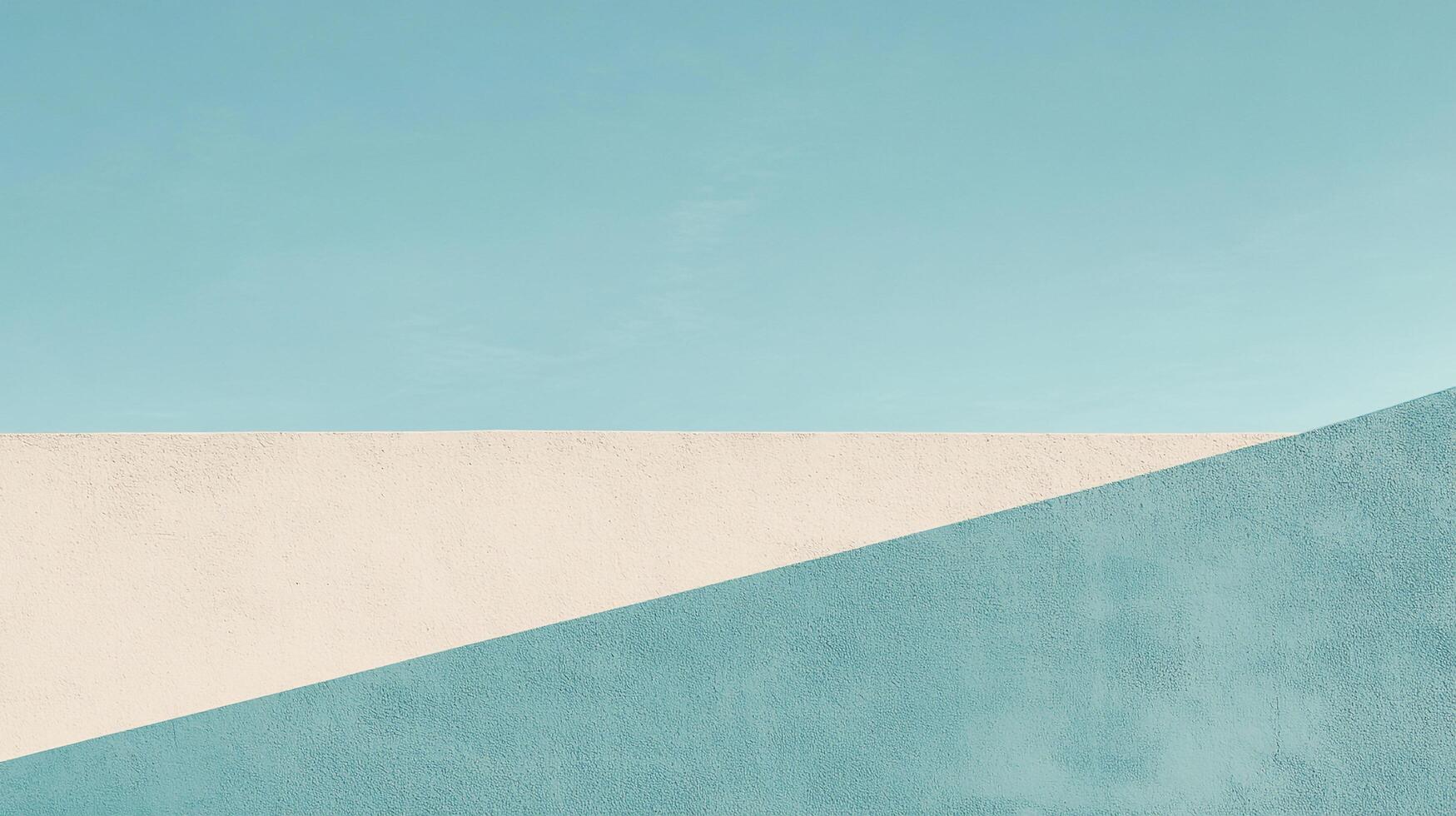 A contemporary geometric art piece features a textured surface against a bright sky, reflecting modern design principles and the beauty of minimalism. photo