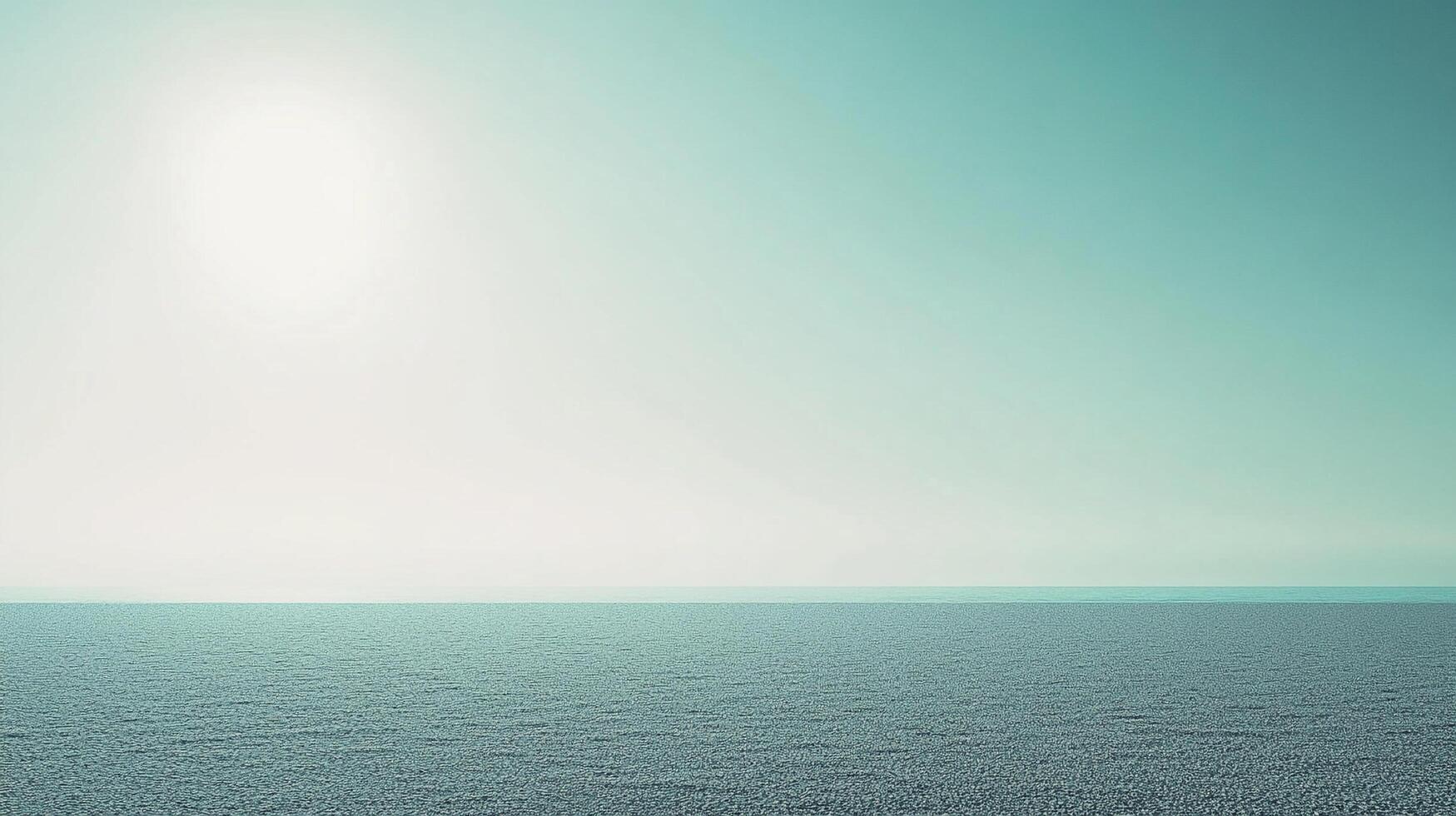 A calm ocean horizon reflects soft light in a serene atmosphere, evoking feelings of peace, tranquility, and contemplation in the viewer's mind and spirit. photo