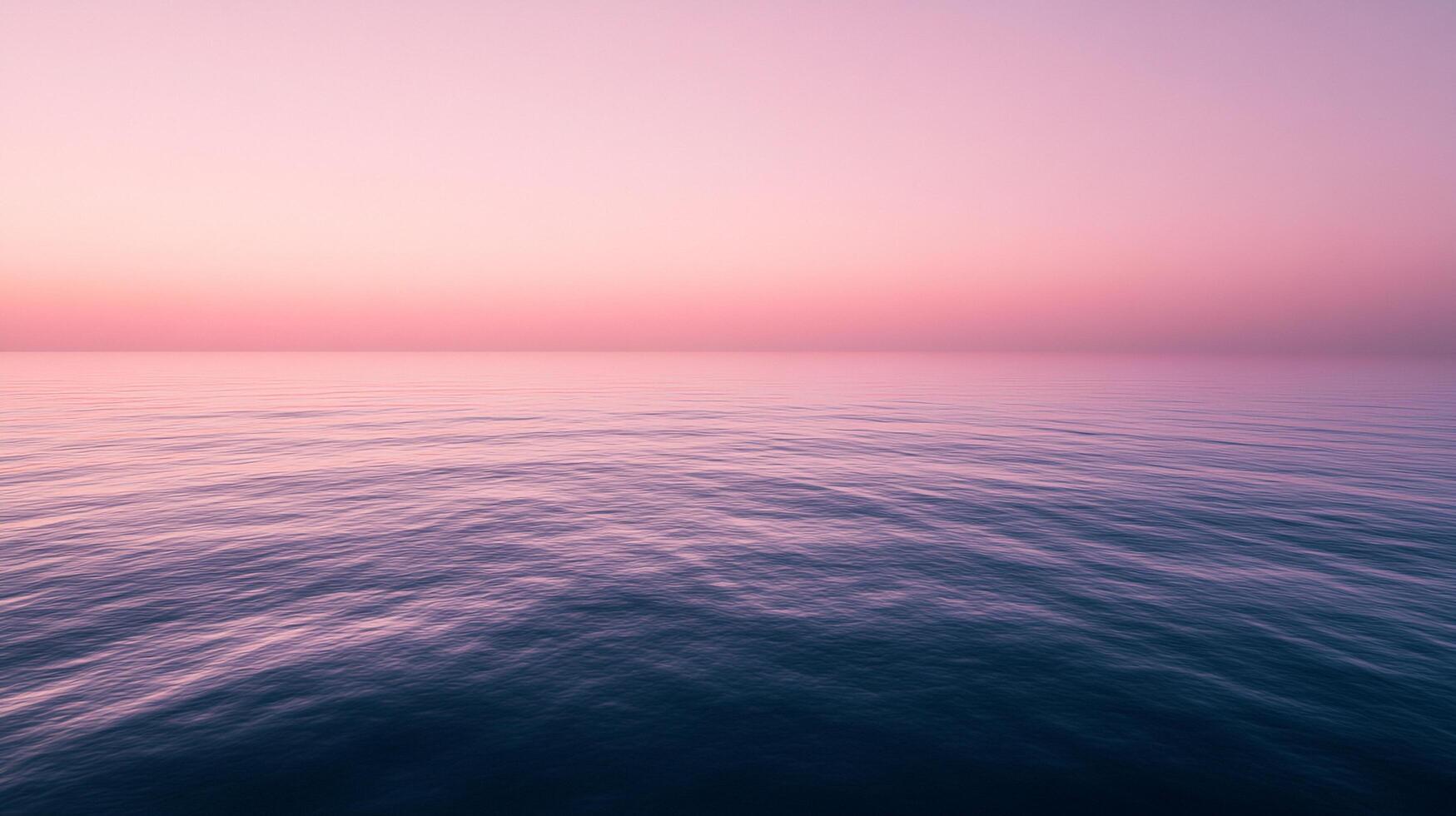A serene pink sunset casts a tranquil reflection on calm ocean waters, inviting the viewer to immerse themselves in the beauty of nature and peaceful moments. photo