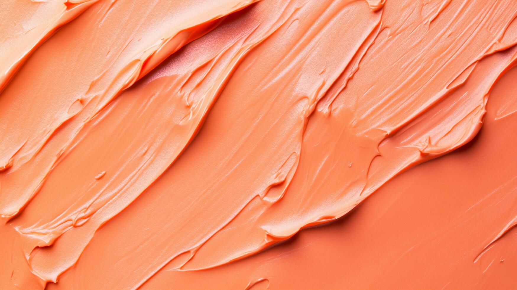 This image presents a creamy orange texture with swirling brush strokes, evoking a sense of warmth and creativity, suitable for artistic projects and backgrounds. photo