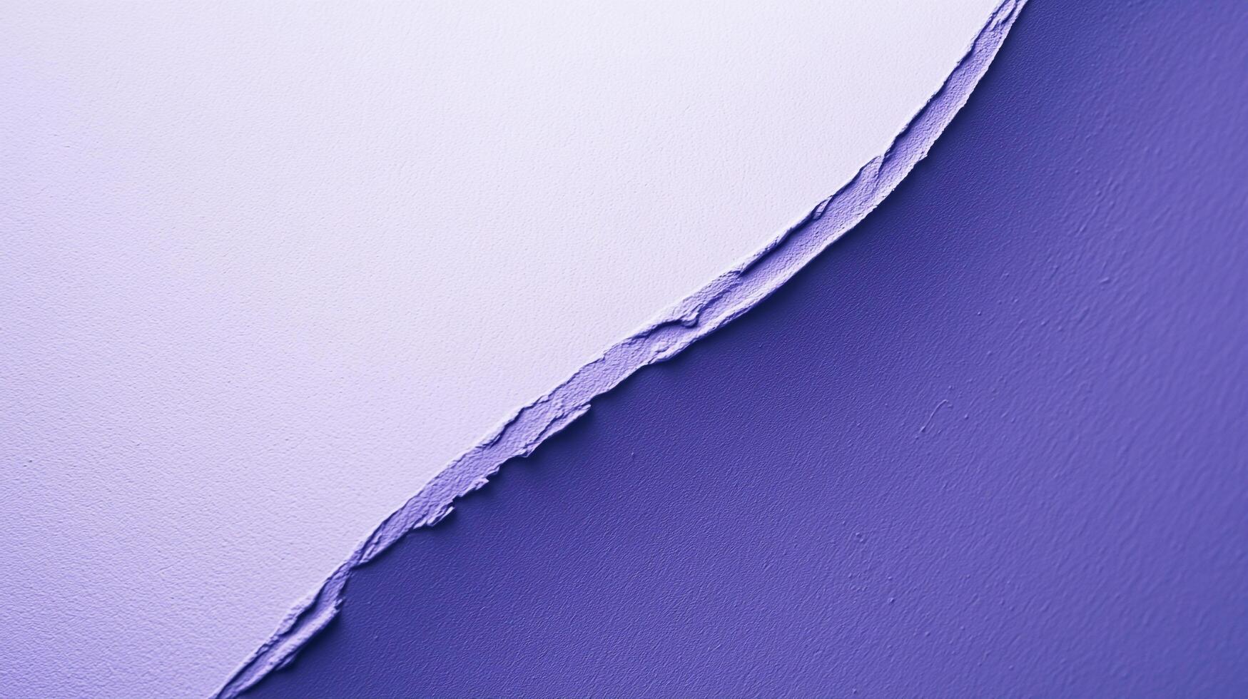 This abstract image displays a creative split texture of purple paint on a canvas, illustrating artistic flair and modern design elements with vibrant colors and contrasts. photo