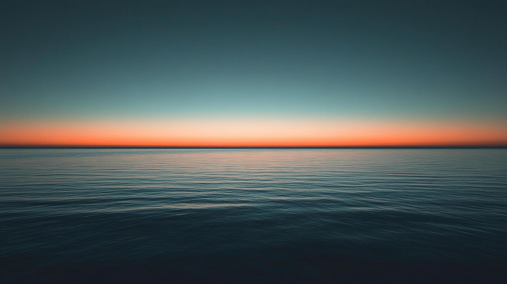 A tranquil seascape at sunset, showcasing a serene horizon where the calming waves reflect the pastel colors of the sky, inviting peace and contemplation. photo