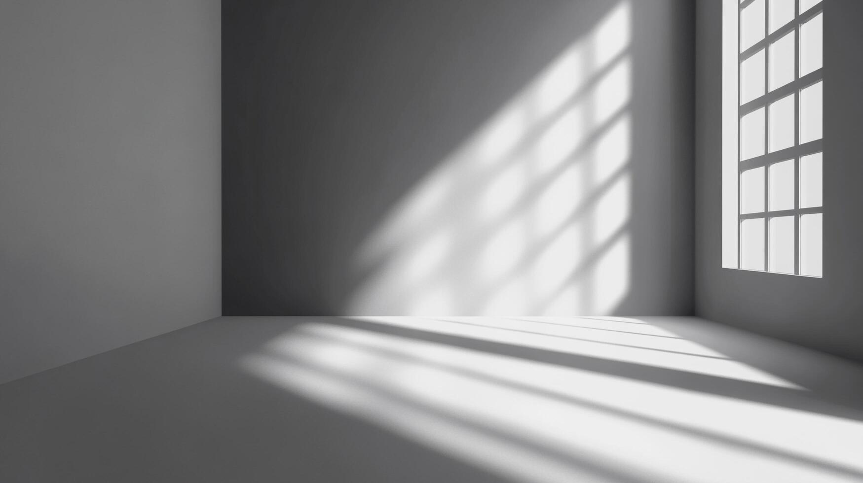 A grayscale architectural view of a stark room with sunlight streaming through a window, casting graphic shadows and highlighting the space. photo