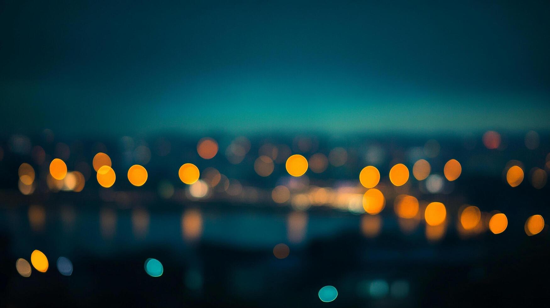 Abstract image of city lights at night, with blurry bokeh effect creating a dreamy, atmospheric feel. Beautiful and serene backdrop. photo