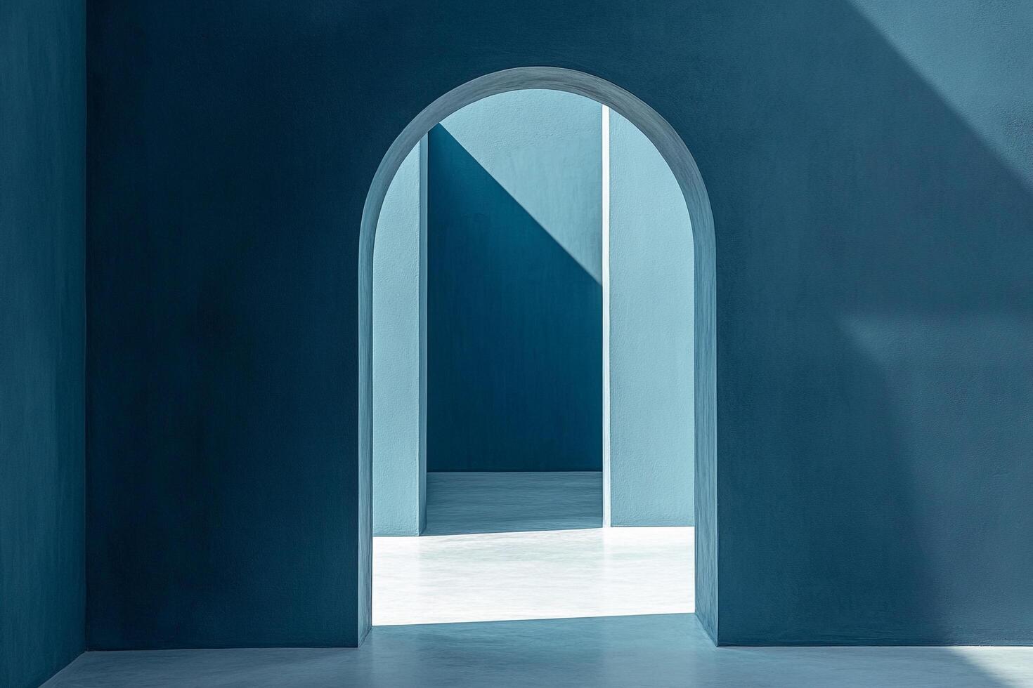 Architectural marvel featuring an archway casting shadows and a clean aesthetic with muted blue tones and minimalist design. photo