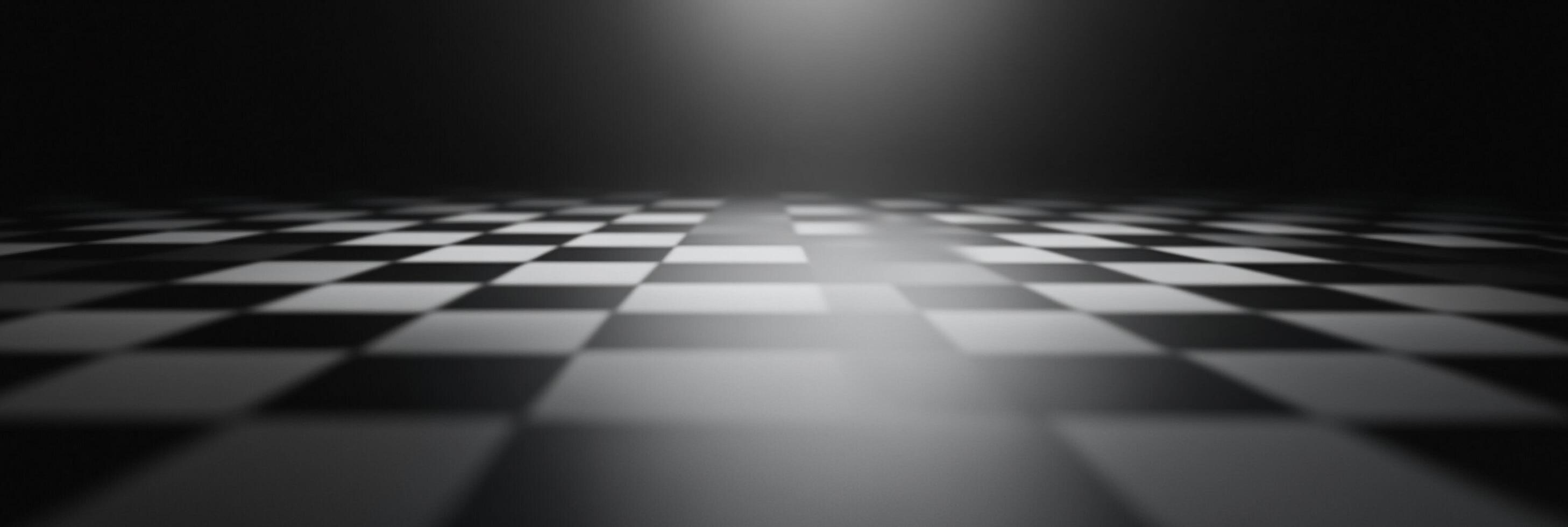 A monochrome checkerboard pattern recedes into a dark background, subtly illuminated with light shining on the surface creating depth and texture. photo