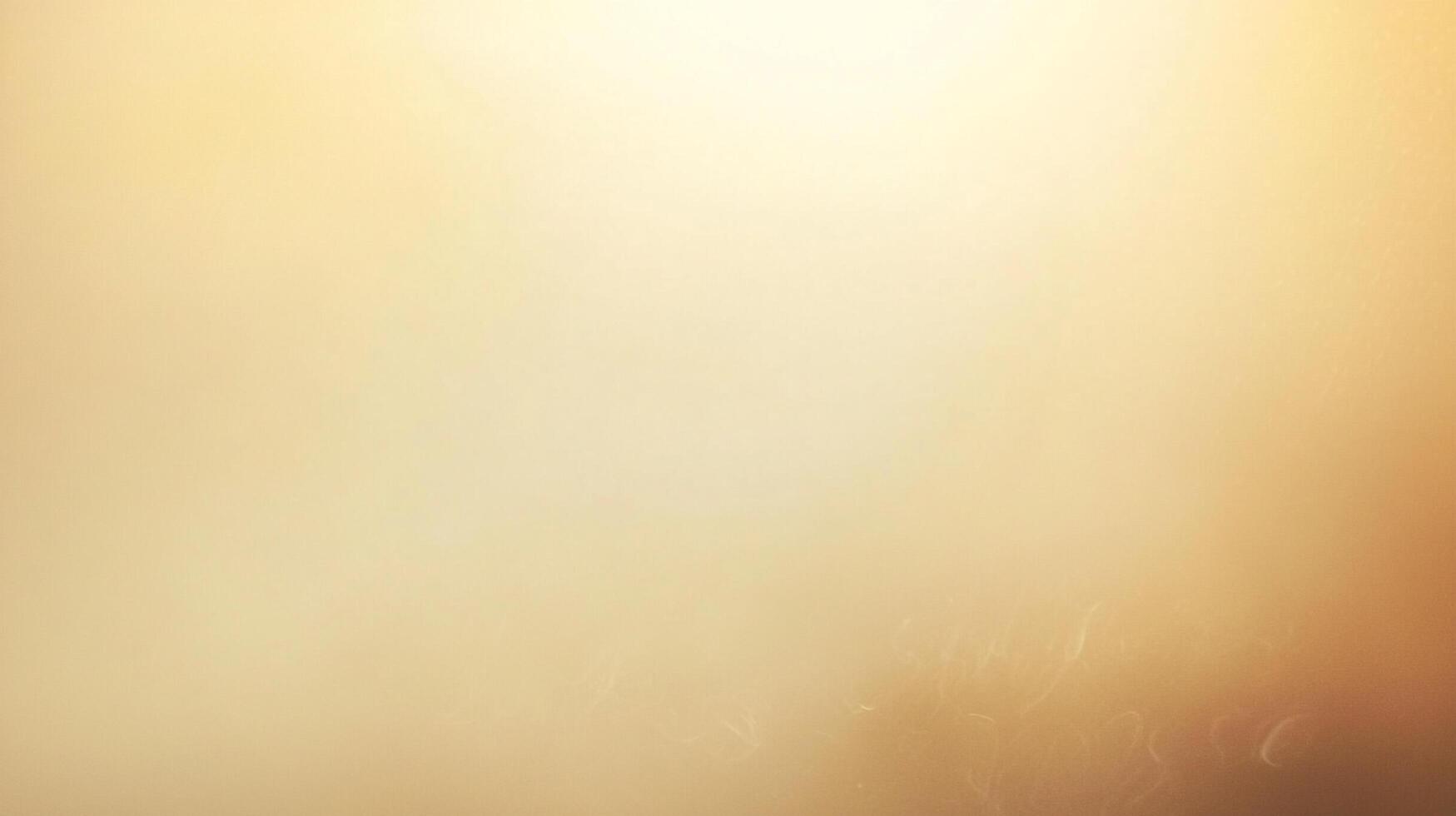 Abstract background with a gradient of warm, golden tones blending seamlessly from light to dark. A soft and ethereal backdrop texture. photo