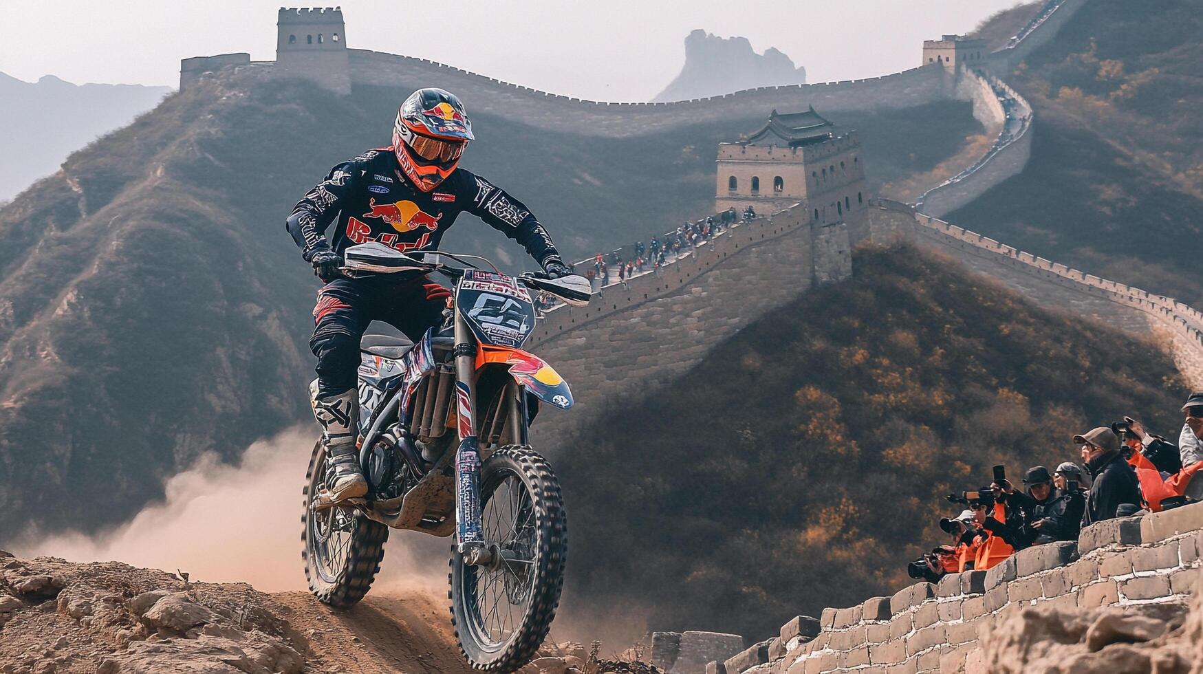 Motocross rider performs a stunt on a dirt bike with the Great Wall of China in the background, watched by an audience, dusty, landscape. photo
