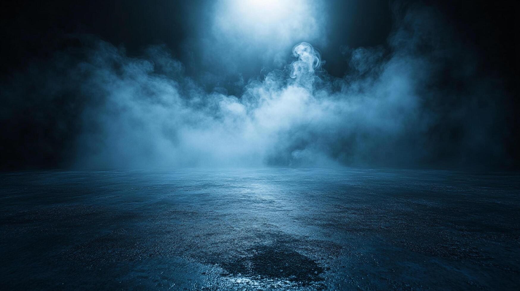 Dark sky with a blue haze and a light shining on it. The light is coming from the sky and is illuminating the ground photo