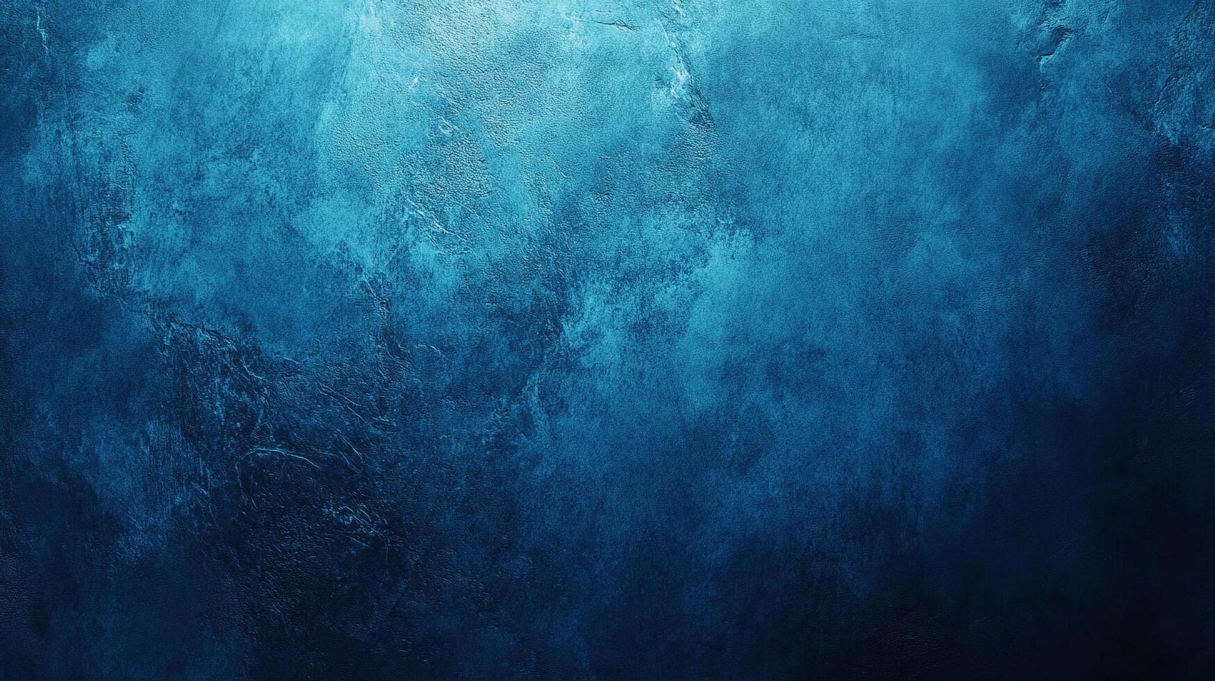 Abstract textured background with a gradient of blue tones, resembling the depths of the ocean or a night sky. Dark and dreamy, with subtle contrasts. photo