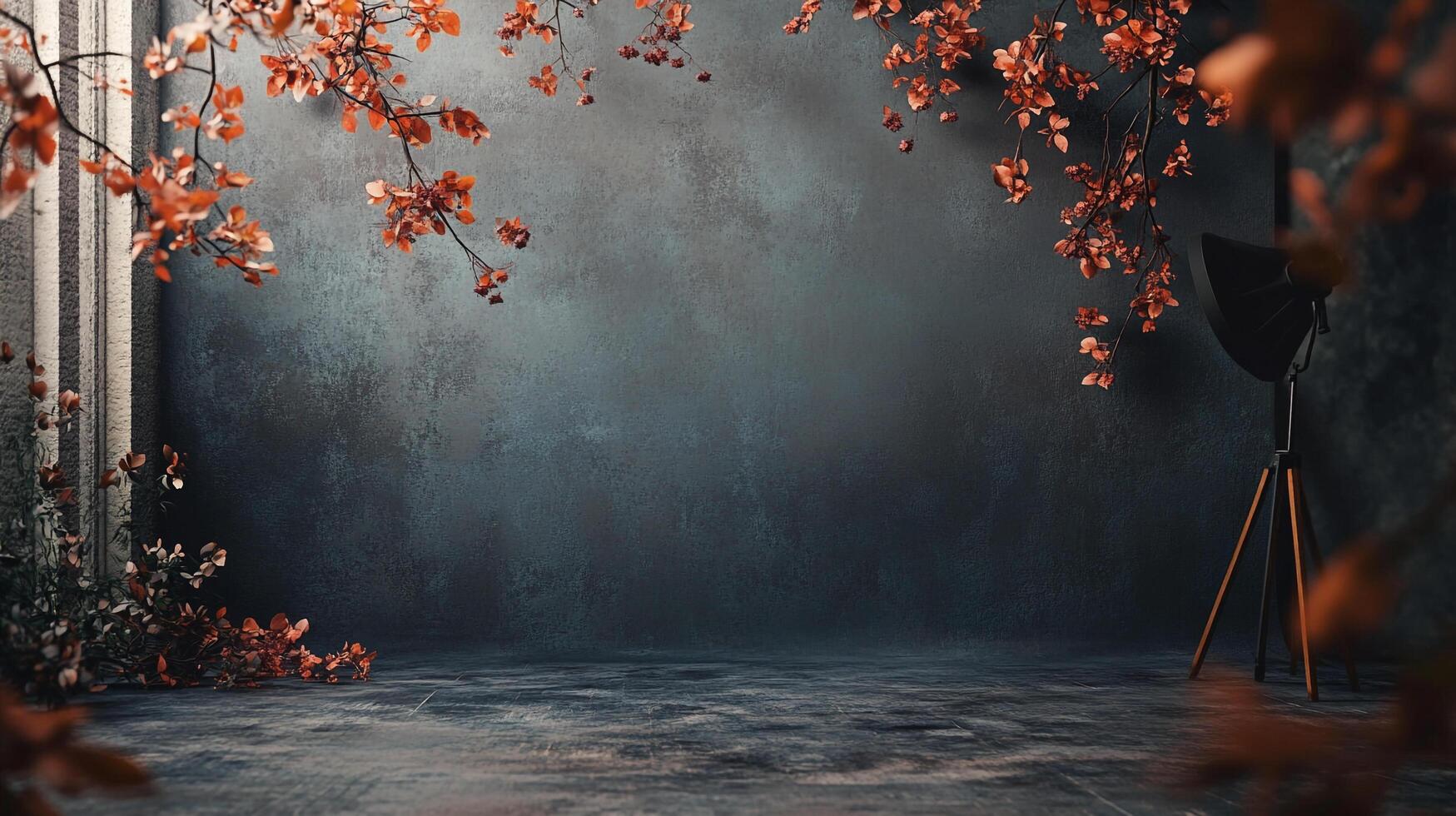 Moody studio backdrop with faux autumn foliage, illuminated by a softbox. Ideal for portraits and product photography. photo