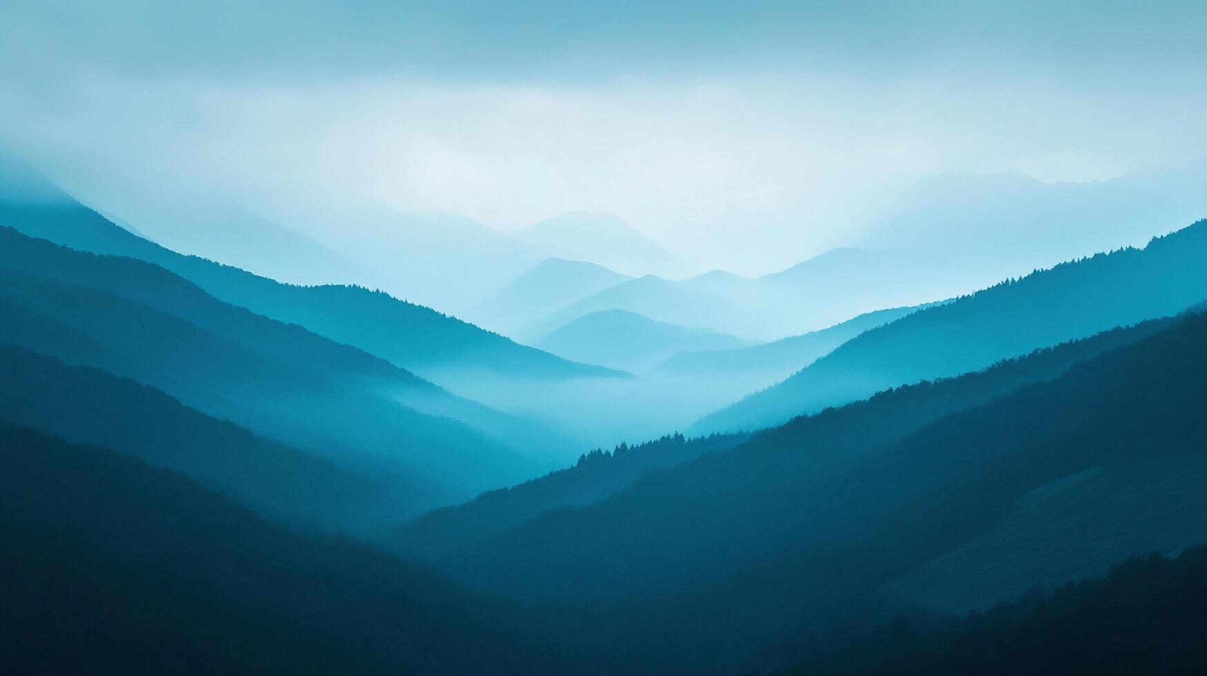 Serene mountain range shrouded in mist, showcasing shades of blue, depth and tranquility, creating a picturesque, calming scene. photo