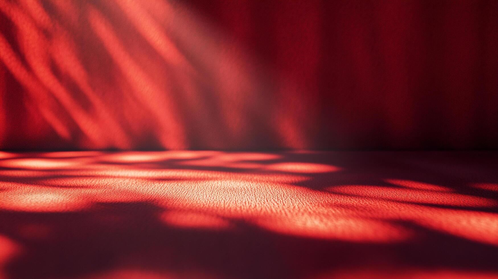 A moody red room with dramatic lighting creates an ambiance of mystery and warmth, ideal for product showcases or artistic expressions. photo