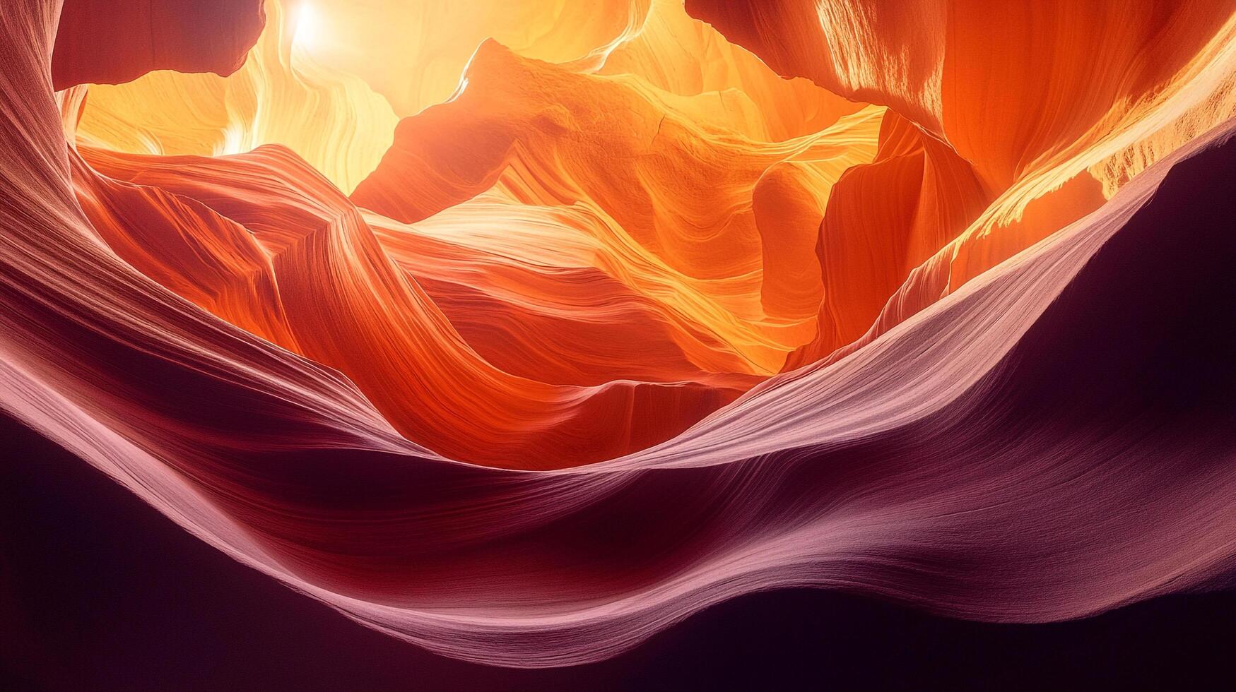 Wavy canyon walls of sandstone rock formations, featuring rich red, orange, and gold hues, highlighted by sunlit textures and smooth lines. photo