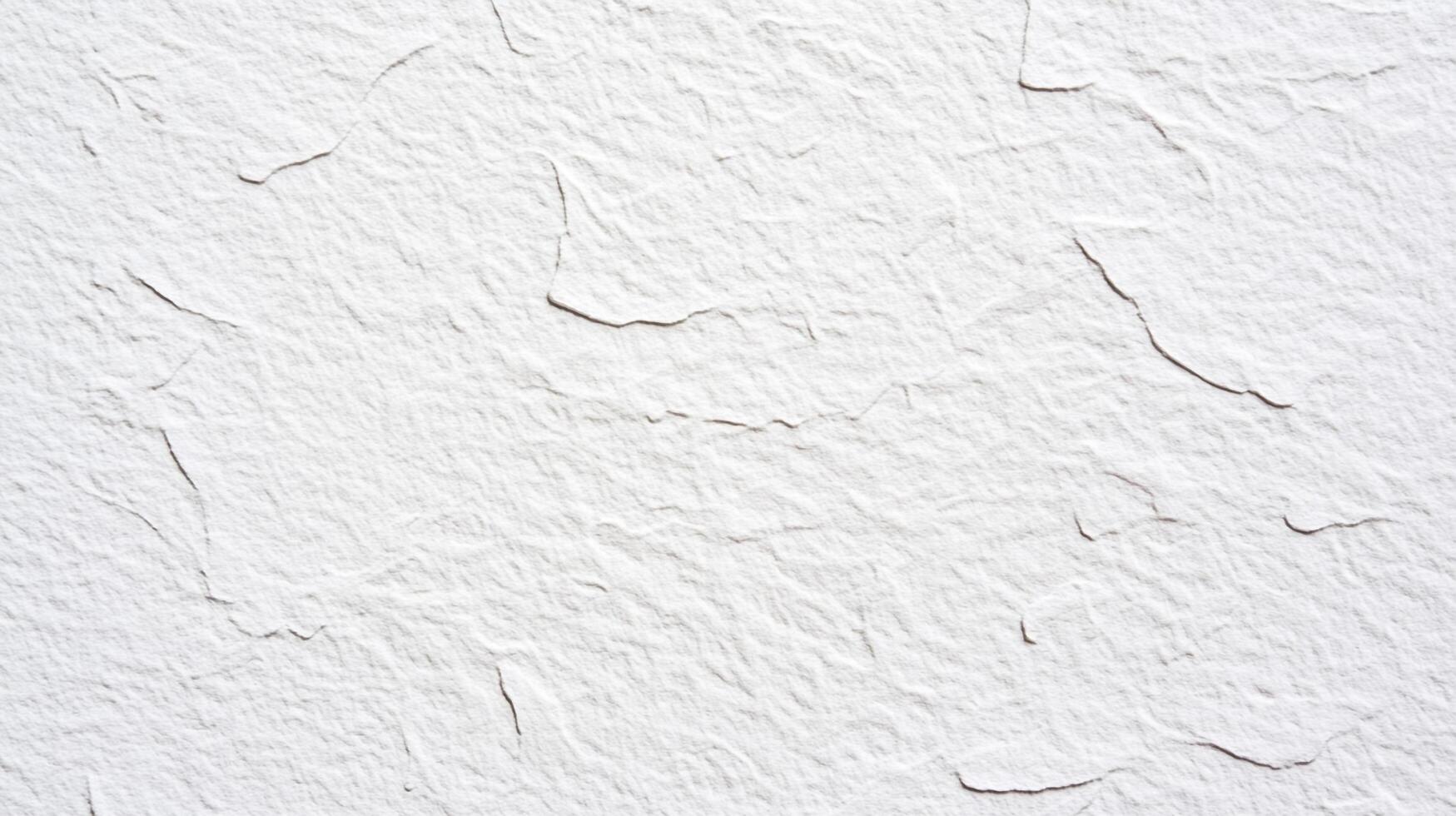 White stone texture with subtle variations in color and cracked surfaces. Minimalist pattern for backgrounds or design elements. photo