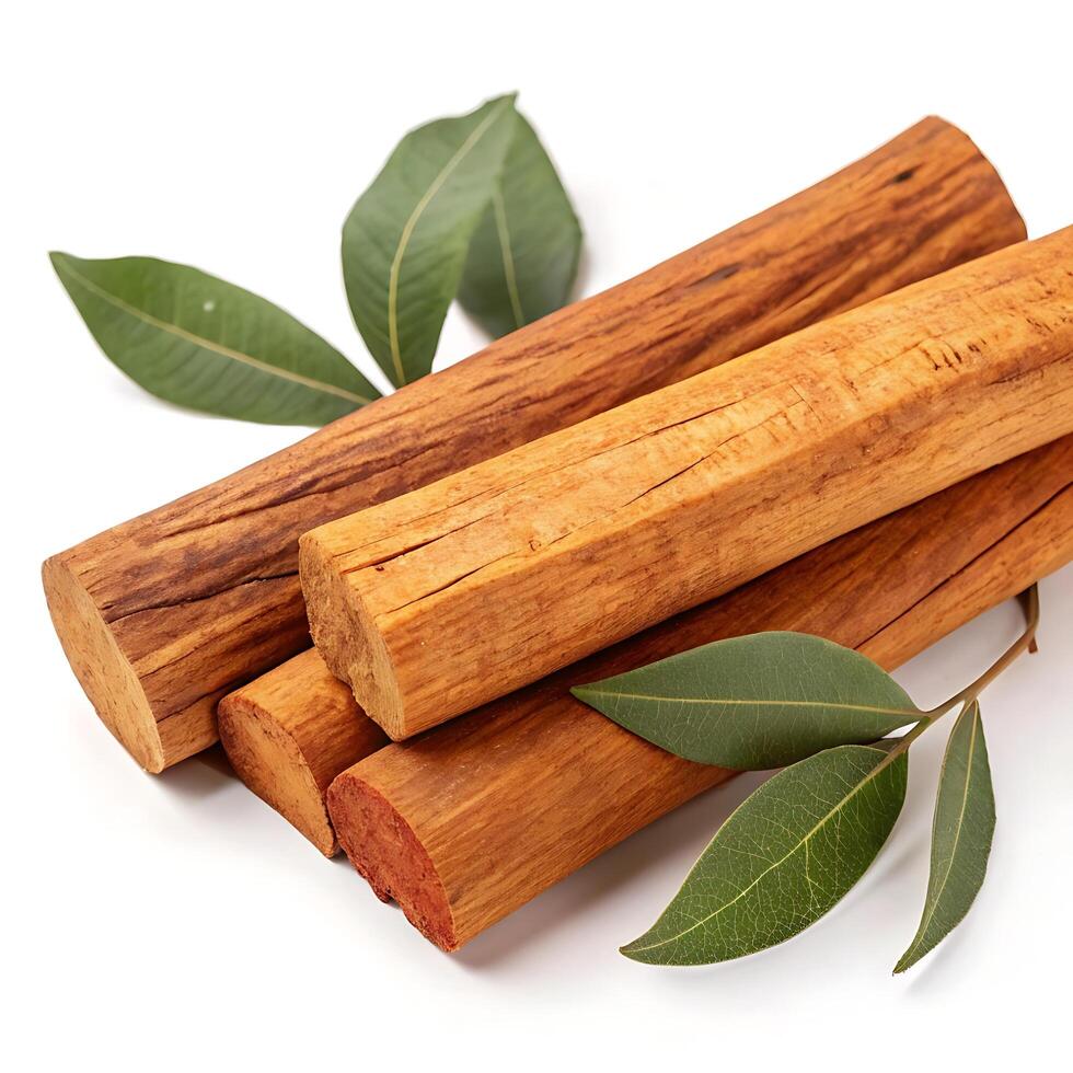 Sandalwood logs with a smooth, textured surface placed on a white background, ideal for natural products, aromatherapy, and wood craftsmanship photo