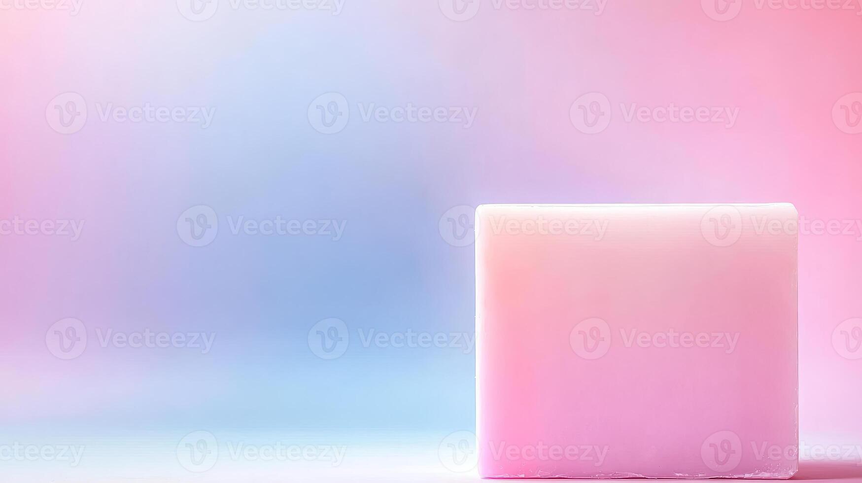 Pink bar of soap on gradient color backdrop photo