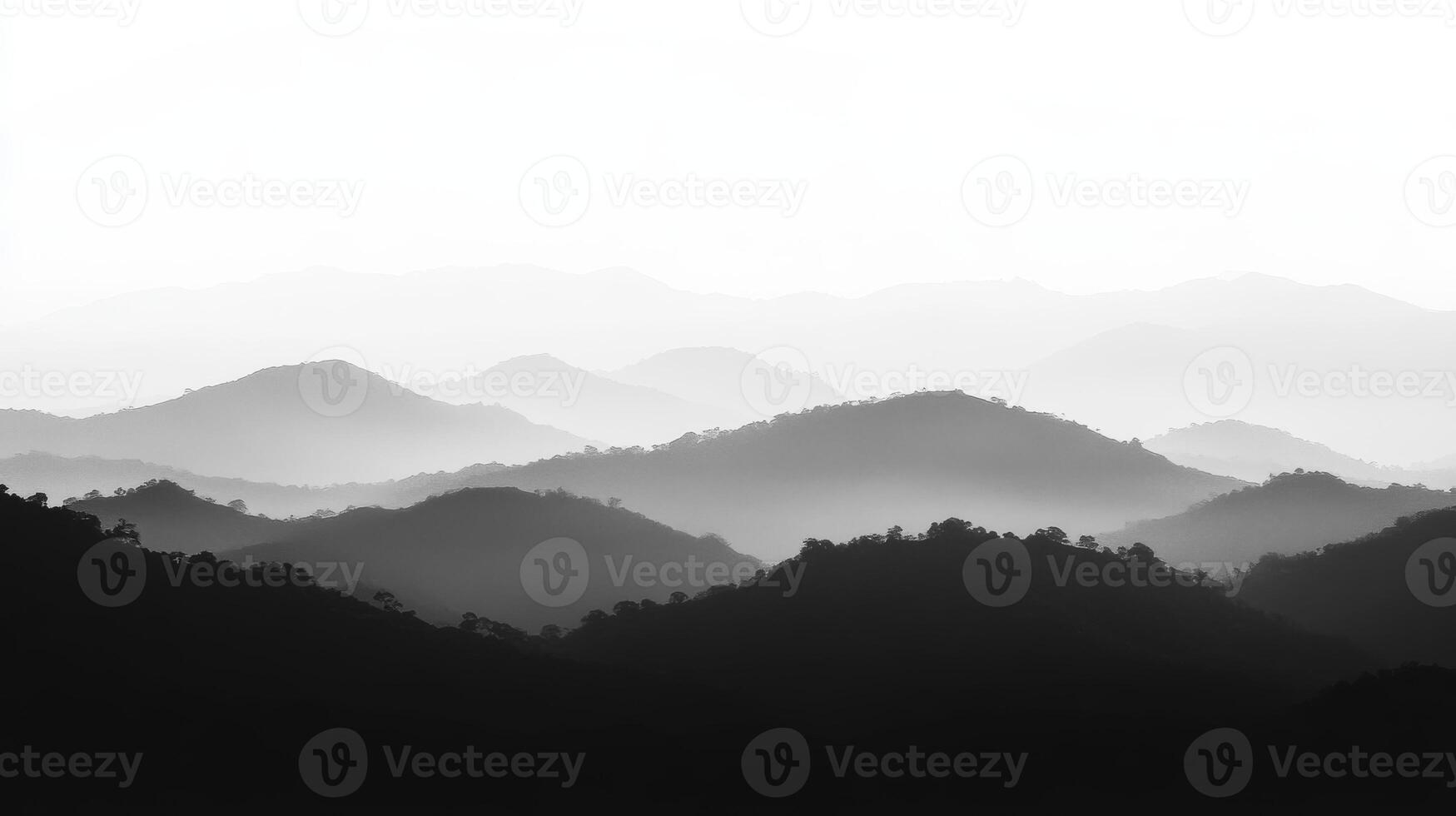 Serene black and white mountain landscape with layered hills photo