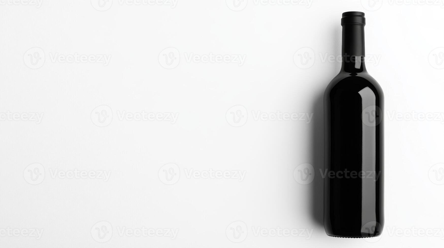 Elegant black wine bottle on a clean white surface photo