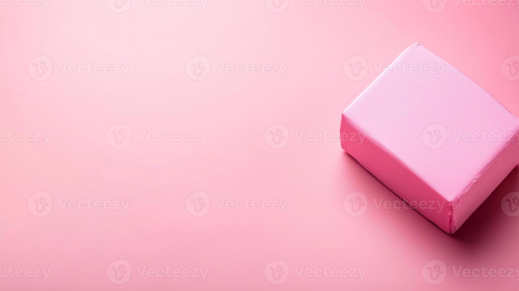 Bright pink package resting on a pastel surface inviting curiosity photo
