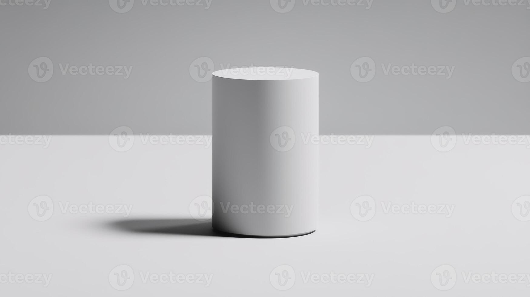 Minimalist cylindrical object on a plain surface in soft light photo