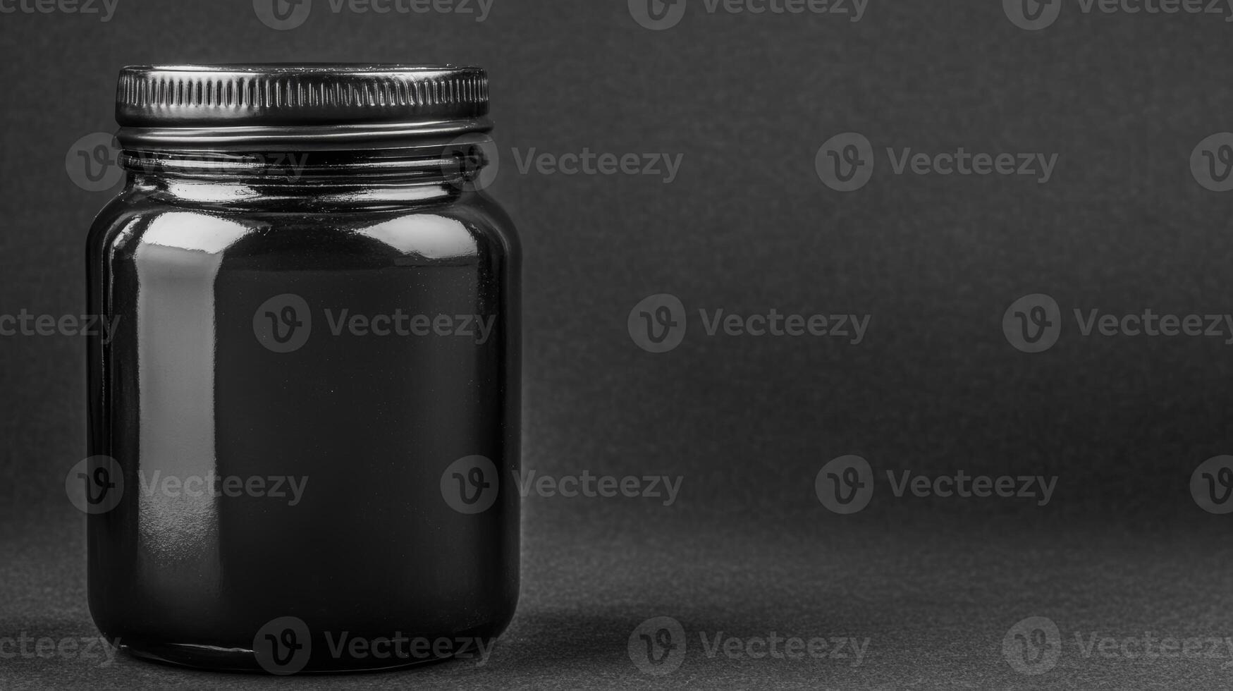 Crafting with a sleek black jar showcasing creativity and design photo