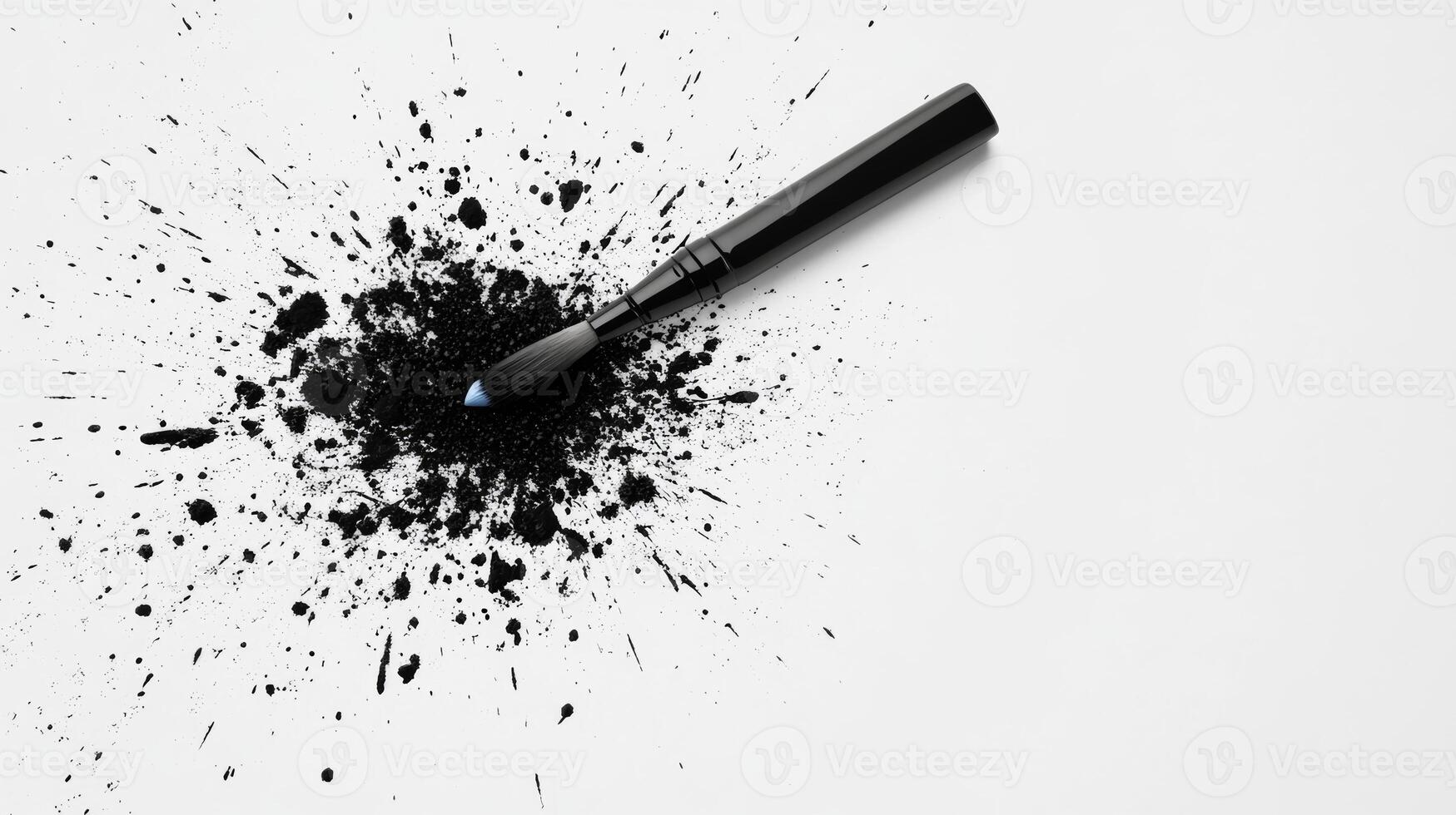 Creative expression through splattered ink on a blank canvas photo