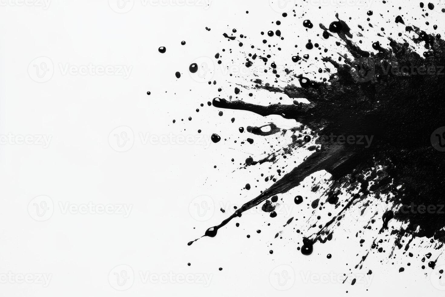 Black paint splatter on white surface creates artistic contrast photo