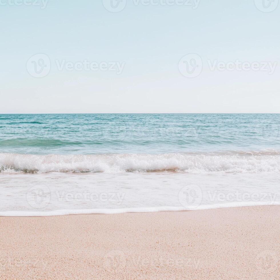 Gentle waves lap against the sandy shore at serene beach setting photo