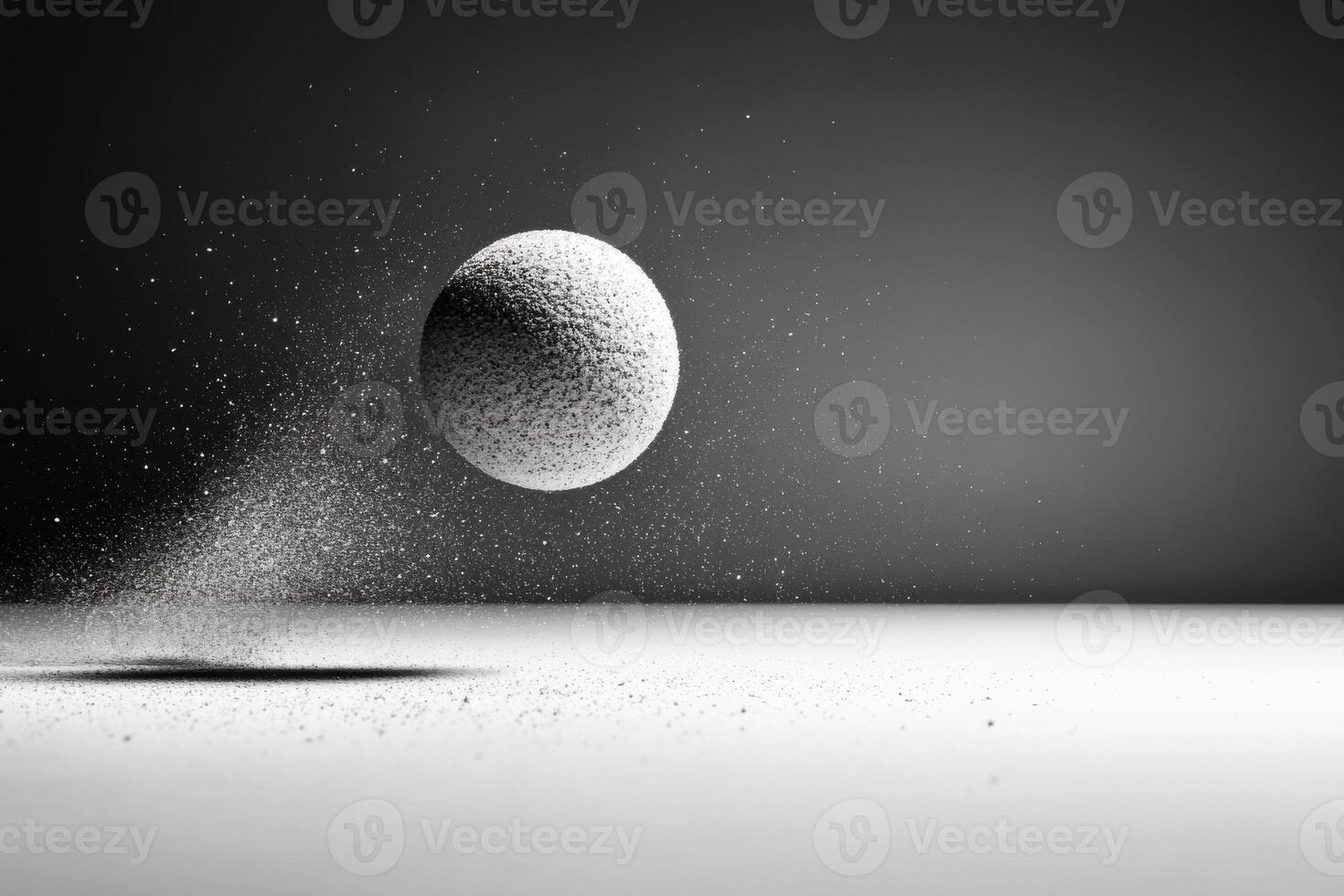 Floating sphere with dust particles on a smooth surface photo