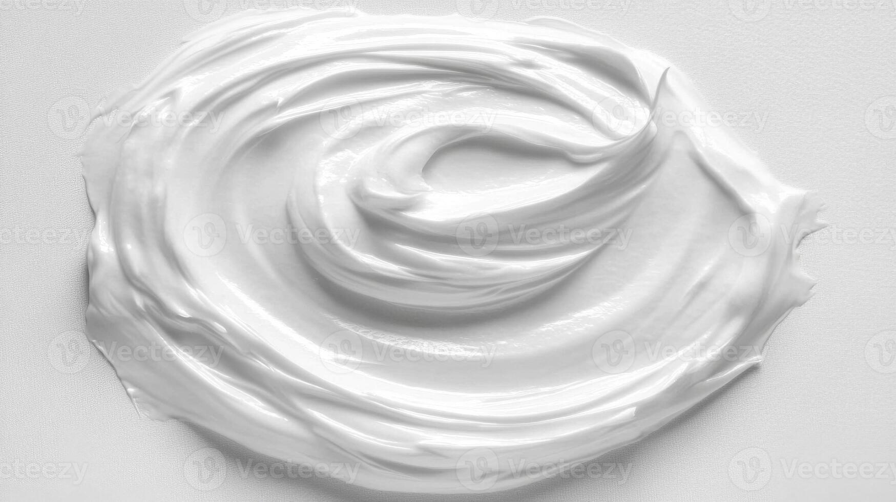 Swirled white cosmetic cream photo