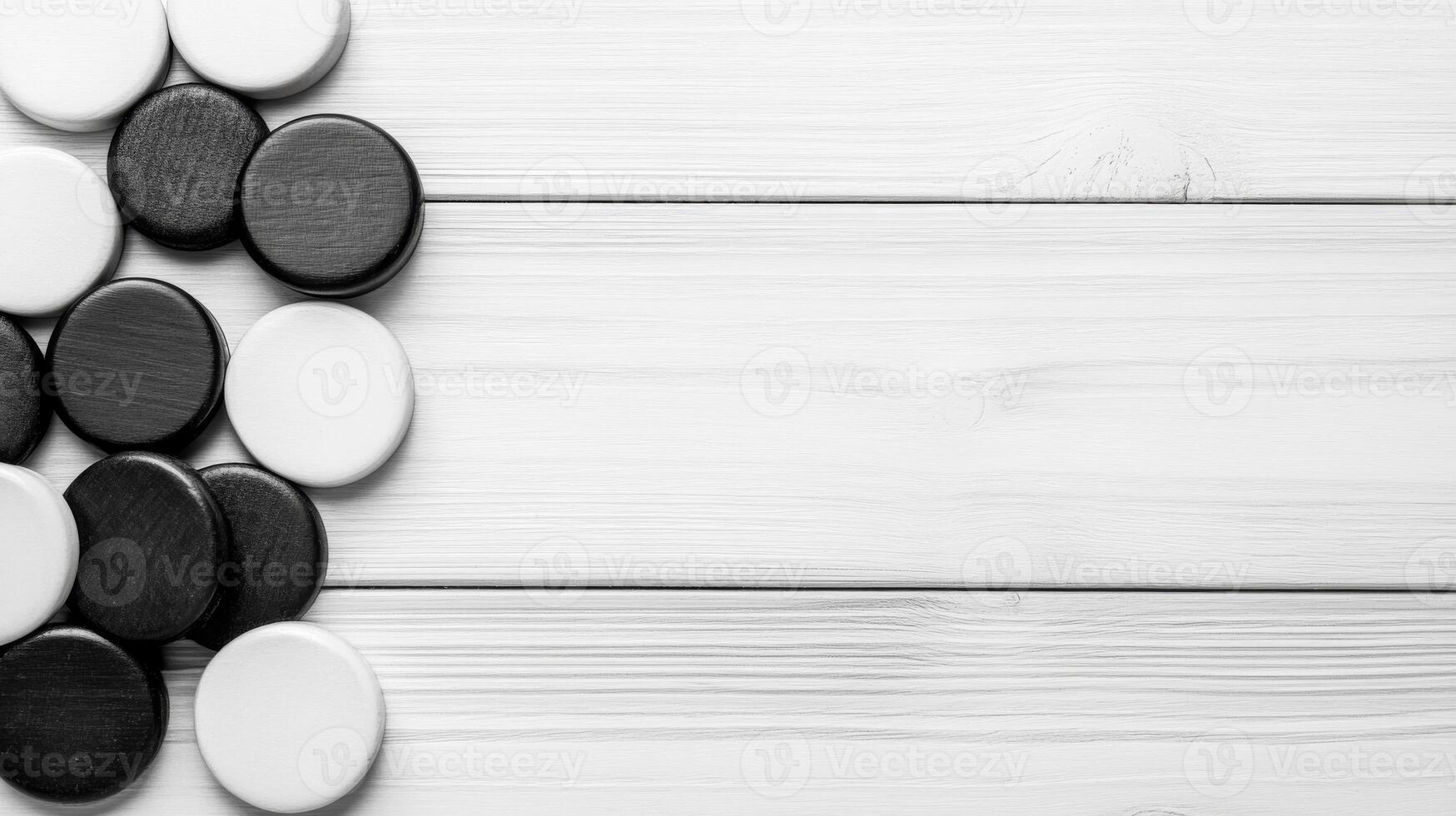 Checkers pieces on wooden surface photo