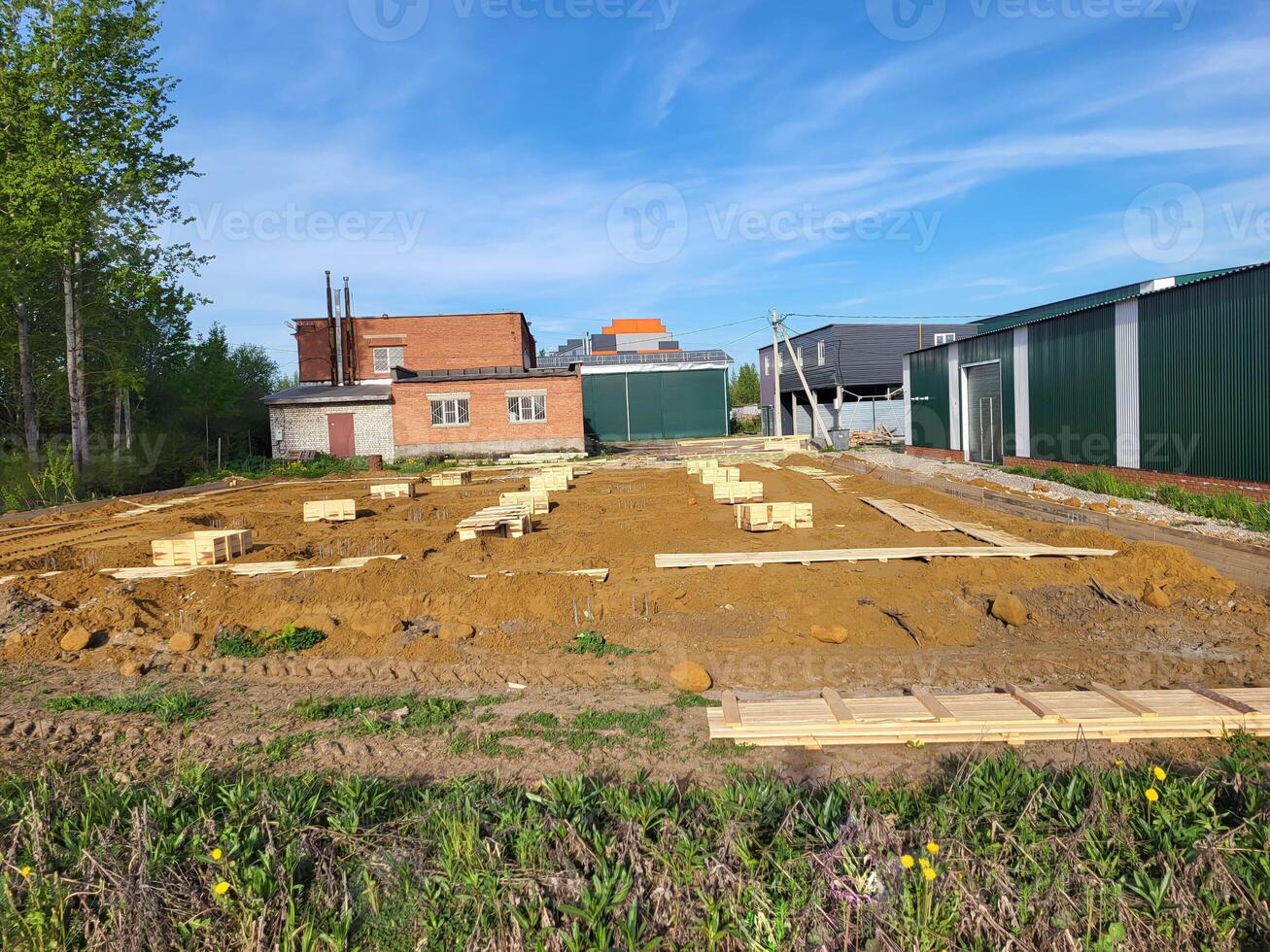 On a sunny bright day at an open construction site for foundation construction. photo