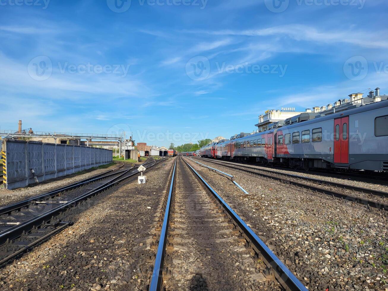 Rybinsk, Russia, 06 22 2024 Railway station, there are wagons and rails extending into the distance. photo
