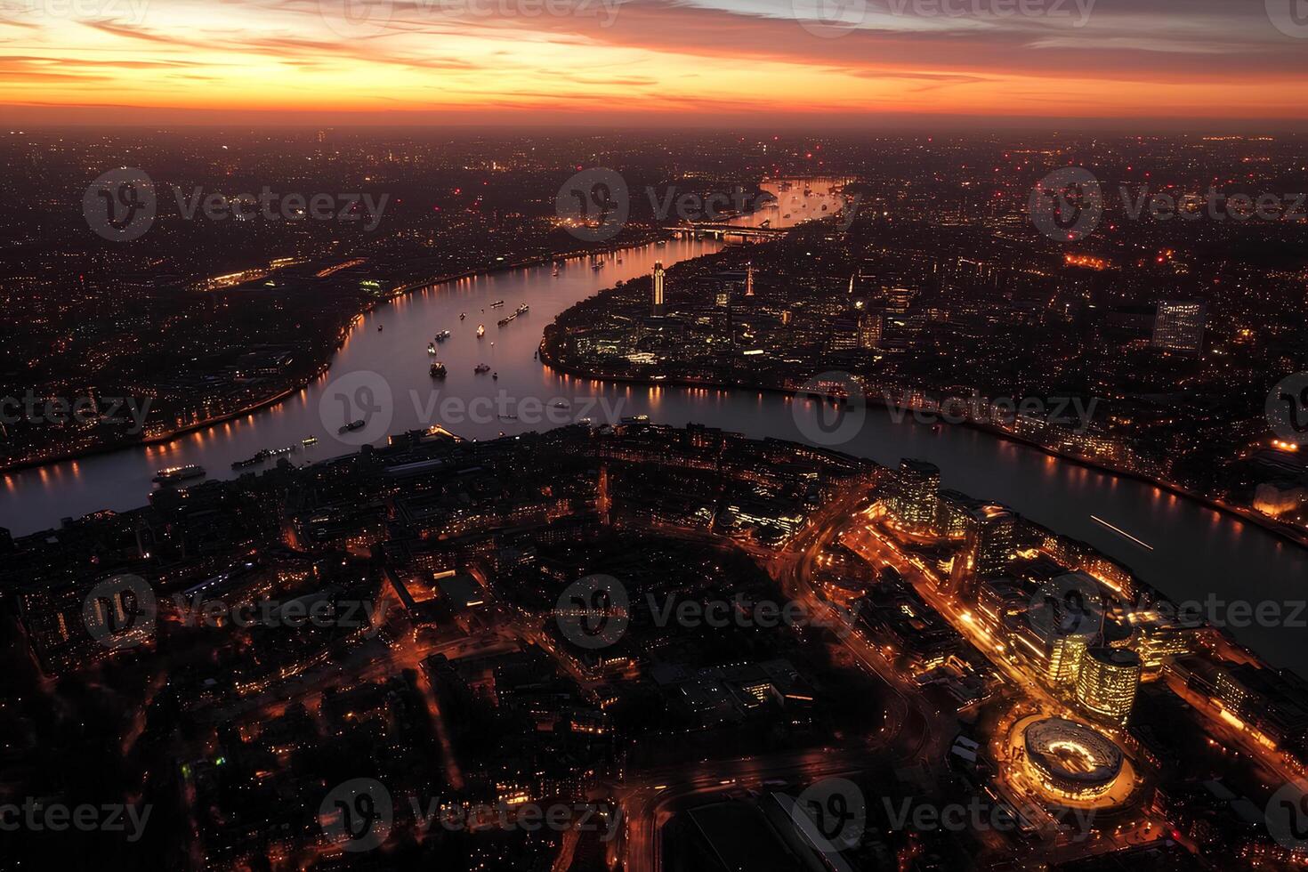 A breathtaking aerial view of London during sunset, showcasing the city's iconic skyline, illuminated buildings, and the soft glow of the setting sun photo