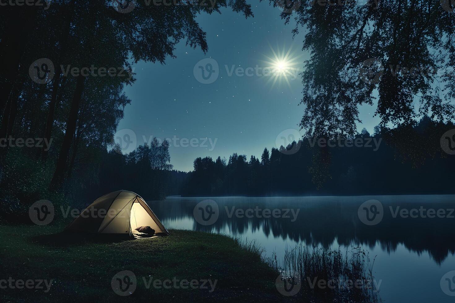 Scenic night view of a campsite by the lake under a starry sky and bright moon, creating a peaceful and adventurous atmosphere photo