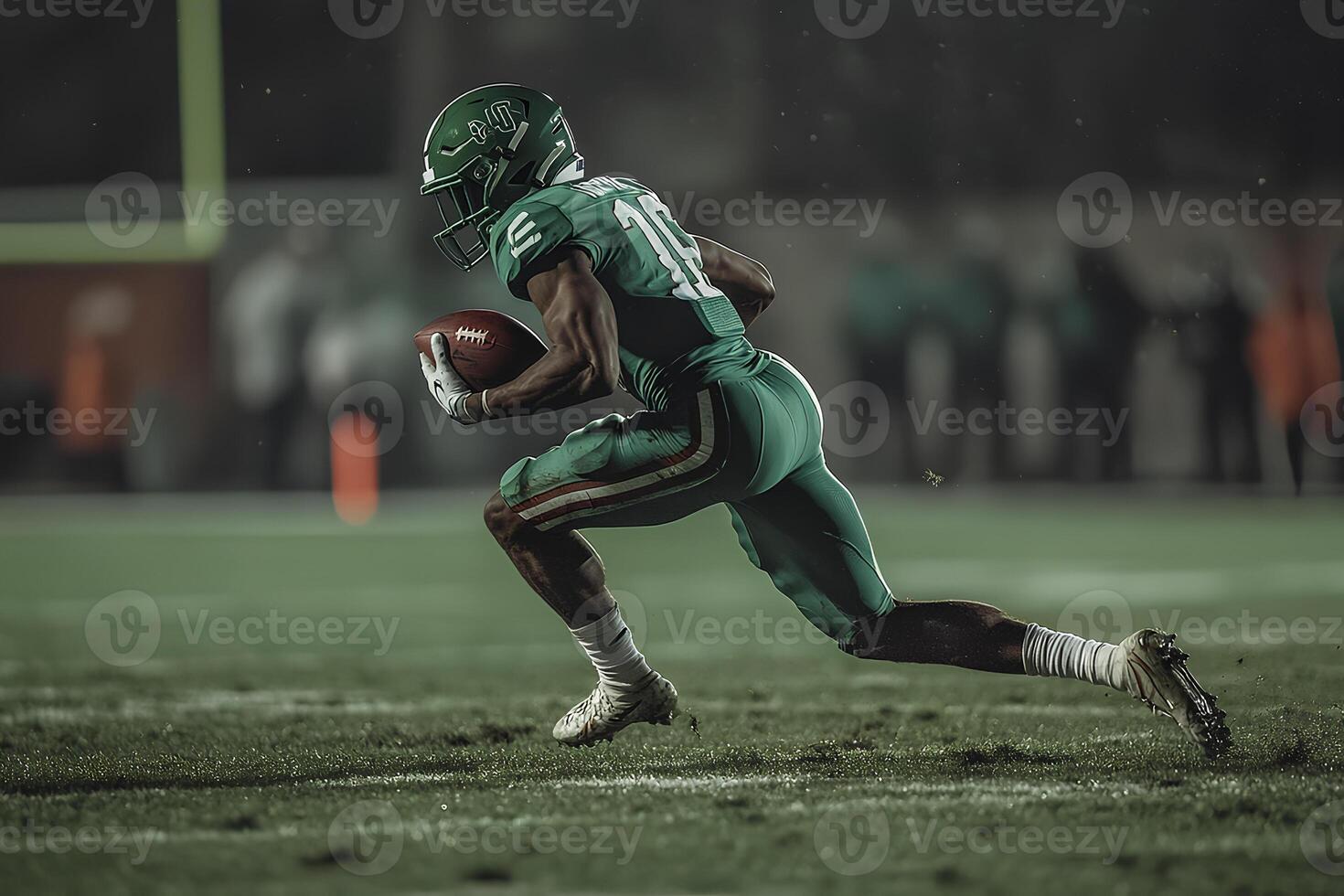 An American football player sprinting across the field, carrying the ball while defenders chase after him in an intense game moment photo