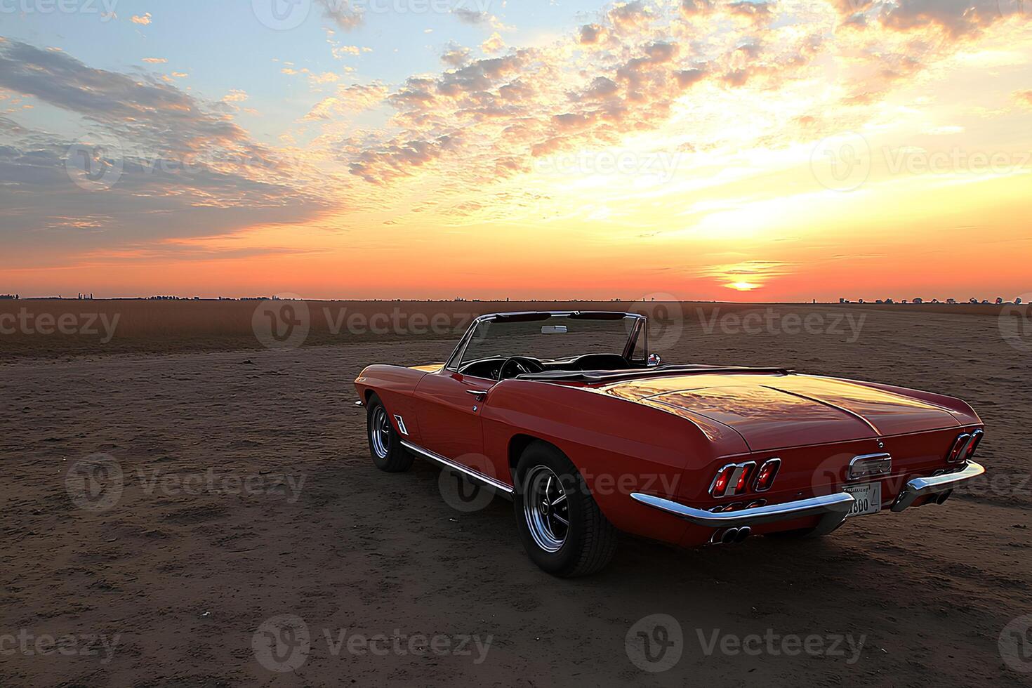 A classic American car parked on the beach, with the warm glow of the sunset casting a golden hue over the scene photo