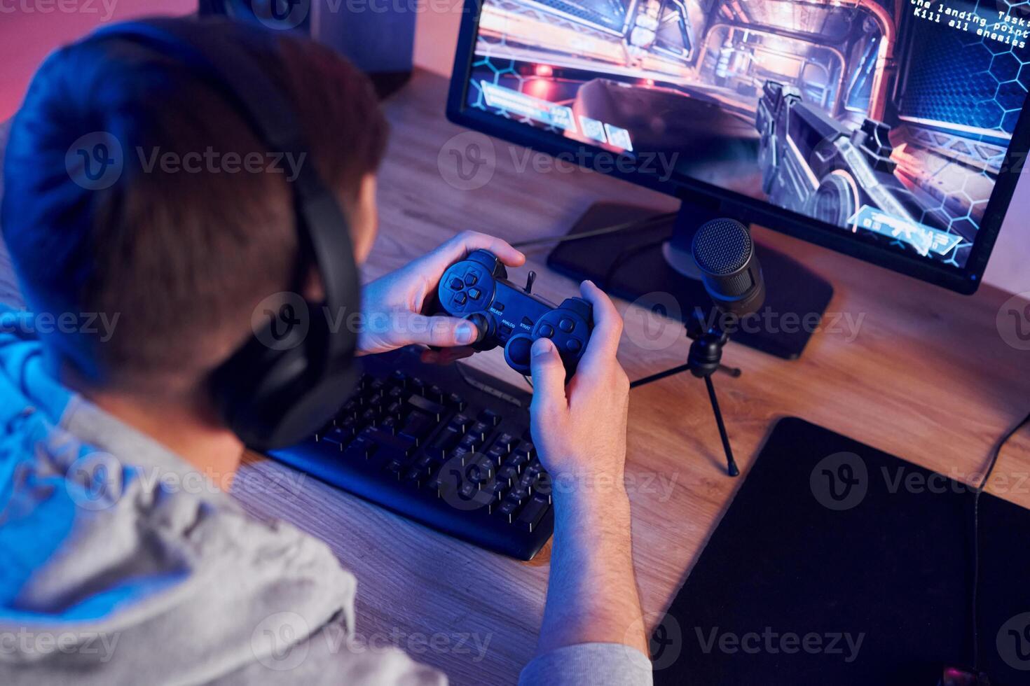A man playing games on a computer photo
