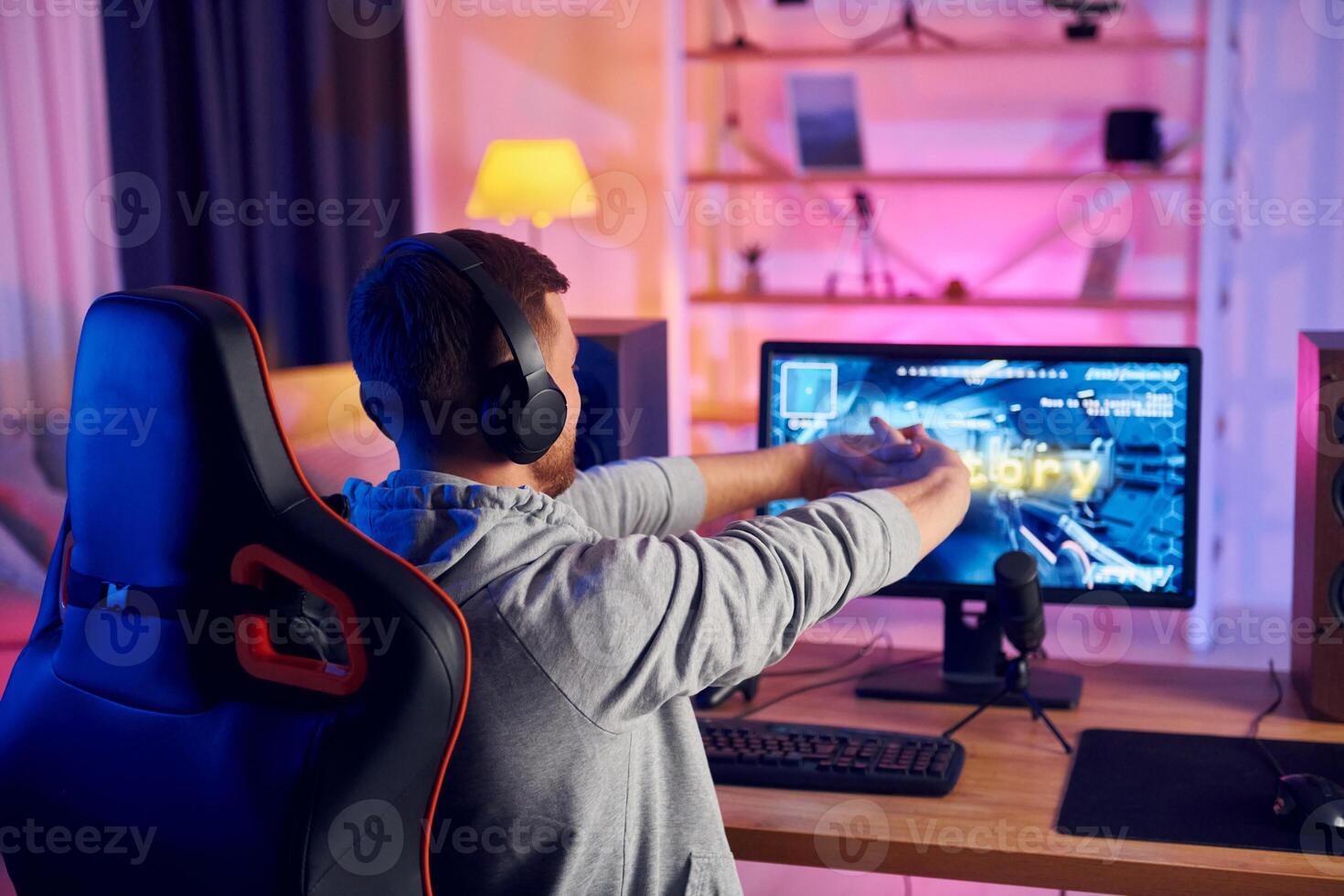 A man playing games on a computer photo