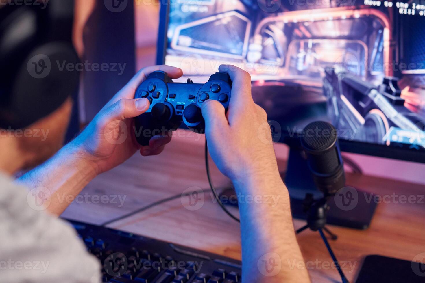 A man playing games on a computer photo