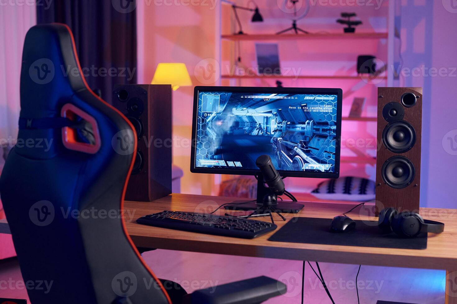 A gaming computer and a monitor on a desk photo