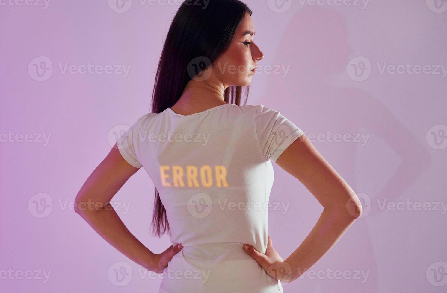 A woman in a white shirt with the word error on it photo