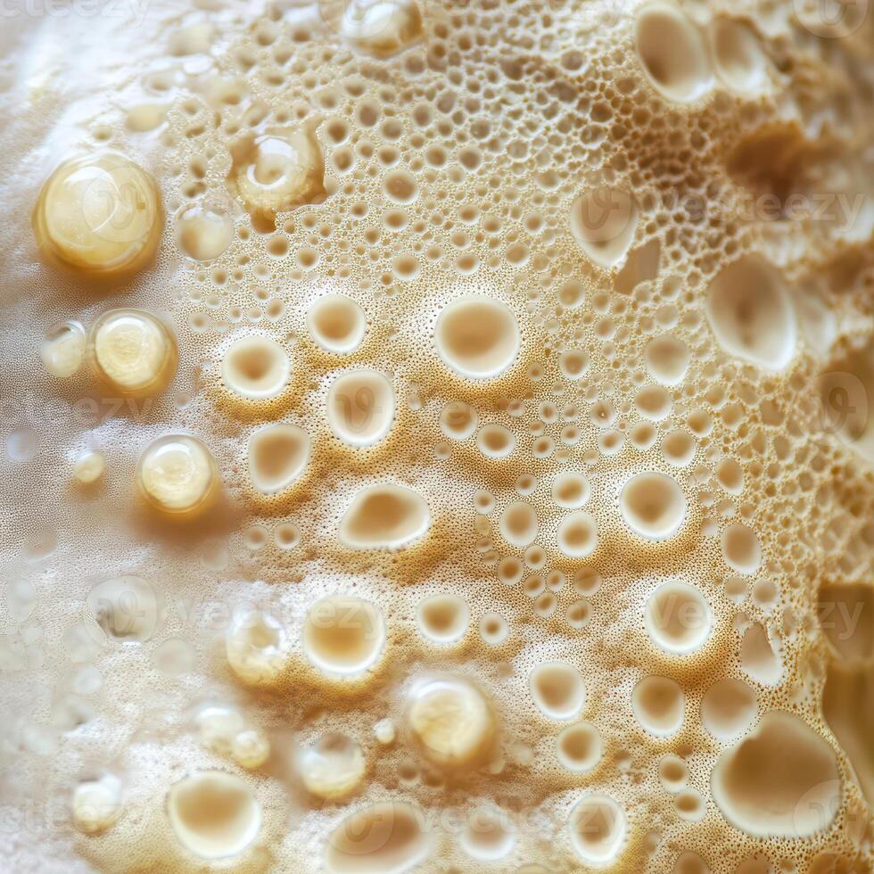 A close up of a white cake with bubbles photo