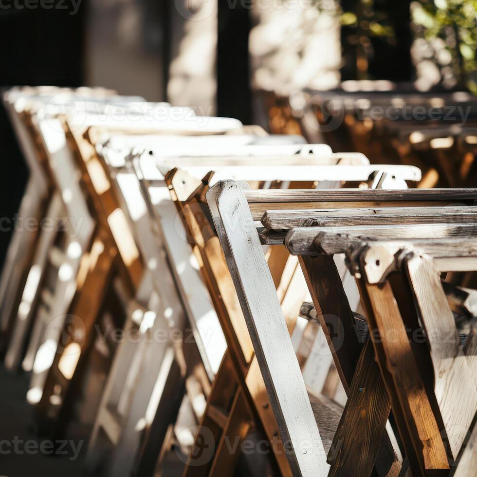 A row of wooden folding chairs photo