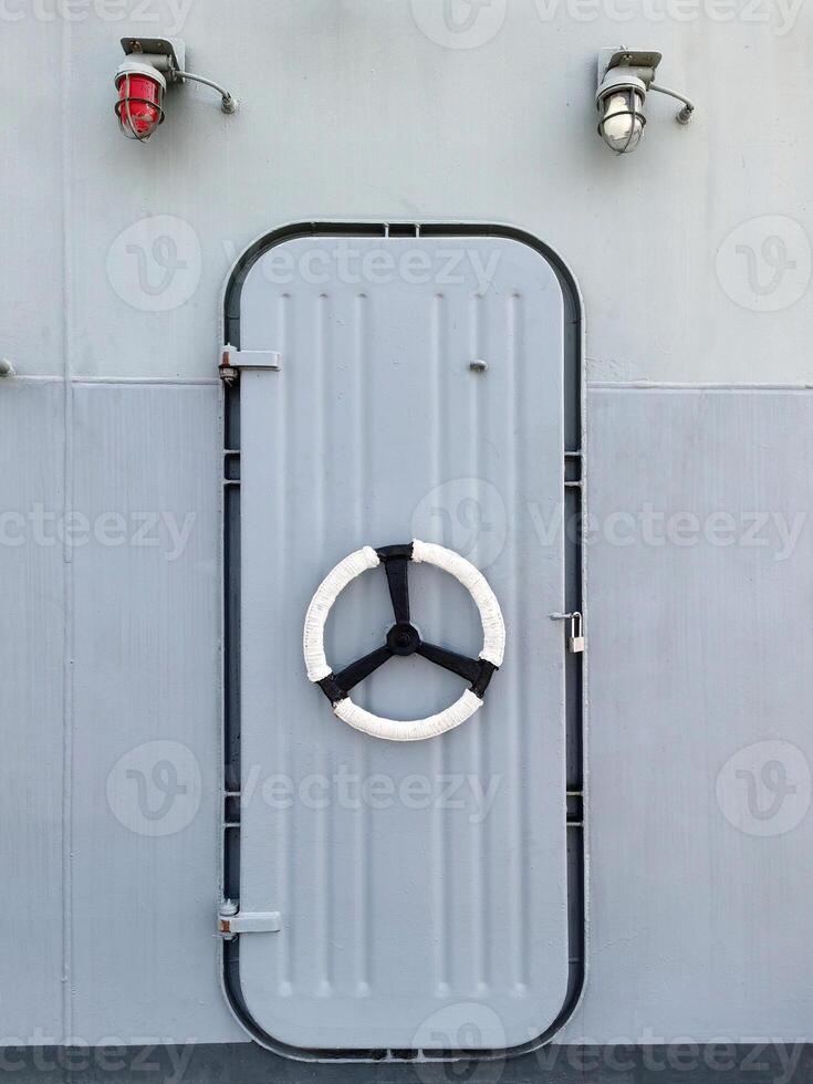 Steel entrance and exit doors, watertight steel doors on warships. photo