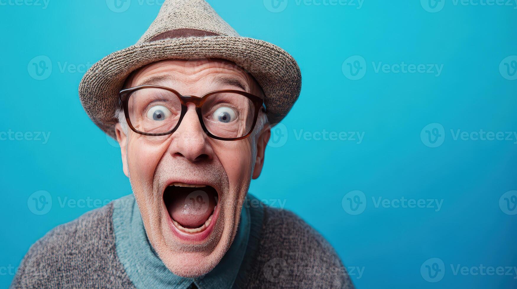 An old man with glasses and a hat is making a surprised face photo